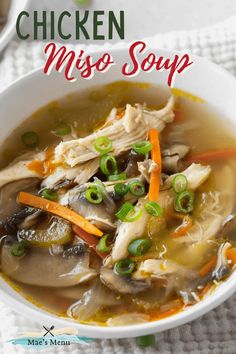 chicken miso soup in a white bowl with carrots and green onions