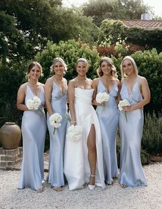 a group of women standing next to each other