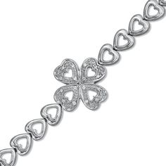 Luck and love - what woman wouldn't want that? Both are on display in this fine sterling silver bracelet. Glistening heart-shaped links surround a 1/20 ct. t.w. diamond-lined four-leaf clover charm that grabs the eye. Buffed to a brilliant shine, this 7.0-inch style secures with a lobster claw clasp. Classic Silver Diamond Heart Bracelet, Fine Jewelry Silver Diamond Heart Bracelet, Silver Diamond Heart Cut Bracelet, Silver Diamond Heart Bracelet, Silver Heart-shaped Diamond Bracelet For Formal Occasions, Classic Sterling Silver Bracelet For Valentine's Day Anniversary, Silver Diamond Heart Bracelet For Valentine's Day, Fine Jewelry Silver Heart Diamond Bracelet, Silver Heart Bracelet With Diamond Accents