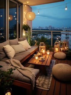 a living room with couches and lights on the balcony