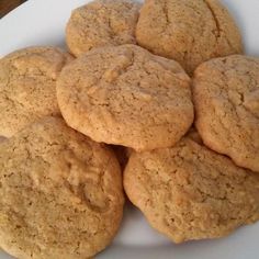 a pile of cookies sitting on top of a white plate