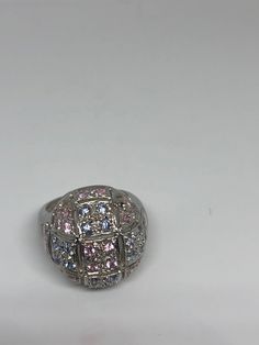 Vintage white and pink CZ ring 925 Sterling Silver Setting Size 8 Can be resized, my jeweler charges $10-$20 All rings are shipped free in the US in a nice gift box. Check out our over a THOUSAND great reviews Engraving is $4 per letter and is not always perfect depending on the piece. It can take a few days if the jeweler is busy. This is payable to Paypal Judithsltd@gmail.com Silver Cocktail, Cz Ring, Cocktail Ring, Cocktail Rings, White Vintage, Class Ring, Statement Rings, Vintage House, Best Gifts