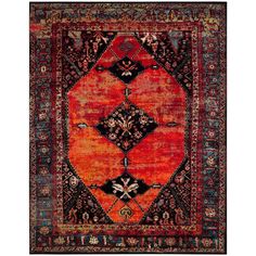 an orange, black and red rug with ornate designs on the bottom half of it