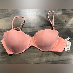 Live Love Dream X Aeropostale This Mermaid Style Bikini Top Exudes An Oceanic Vibe. The Brazilian Swimsuit Top Features An Underwire, Supportive Padded Cups In Seashell Shapes With Tonal Seamed Details, Adjustable Shoulder Strings, A G-Hook Closure At Back For A Flattering And Secure Fit. -Color: Salmon Pink/Light Coral -Size: Xl -Seashell Shaped Bra Cups -Back G-Hook Closure - Adjustable Cami Straps - Underwire Support - Unmovable Paddad Cups - 80% Nylon, 20% Spandex - Wash Dark Colored Clothes Padded Push-up Swimwear, Summer Stretch Push-up Swimwear, Trendy Fitted Bra With Padded Cups, Fitted Push-up Swimwear For Poolside, Padded Fitted Strapless Swimwear, Strapless Padded Fitted Swimwear, Fitted Padded Strapless Swimwear, Trendy Fitted Summer Bra, Fitted Mermaid Swimwear For Vacation