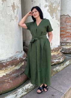 "Handmade washed linen mid-calf dress with short sleeves, pockets and belt. Made with love for You. *100% local medium weight linen *Suitable for maternity *Each item is individually cut and sewn by order *The model height is 172 cm *The model is wearing size M *The dress color - Dark moss green *Note that colors may look different on your display depending on their settings and technical characteristics. Please let us know if you need different measurements or colors. CARE *Machine wash up to 4 Short Sleeve Linen Dress With Tie Waist, Belted Linen V-neck Midi Dress, Linen Belted V-neck Midi Dress, Belted V-neck Linen Midi Dress, Casual Linen V-neck Dress With Tie Waist, Short Sleeve Linen Midi Dress With Belt, Belted Linen Midi Dress With Short Sleeves, Linen Belted Midi Dress With Short Sleeves, Belted Short Sleeve Linen Midi Dress