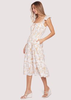 Let your beauty radiate while wearing the Acropolis Hills Midi Dress! An eyelet floral print sharpes a flowy and forgiving silhouette with elastic waist detail. The sleeves offer an elastic shoulder trim so you can have the option to wear it on your shoulders for a square neckline detail or sport it off the shoulder! This relaxed fit is fully lined, has an adjustable tie at bust, and features side pockets for ultimate ease! WDWC23896 Imported 100% Cotton Model is 5 ft 9 inches; Bust: 32", Waist: The Acropolis, Spring Awakening, Acropolis, Family Lifestyle, Crochet Details, Romantic Style, Square Neckline, Dresses Xs, Different Styles