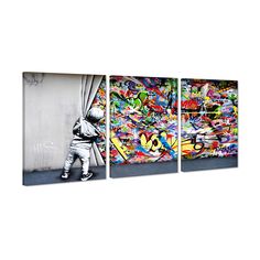 three canvases with graffiti on the wall and one has a child standing in front of it