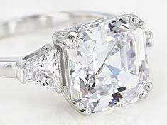 Charles Winston for Bella Luce ® white diamond simulant 8.54ctw asscher and trillion, rhodium over sterling silver ring. Measures approximately 0.81"L x 0.38"W and is not sizeable. The diamond equivalent weight is 6.08ctw. Asscher Cut Ring, Asscher Cut, Diamond Simulant, White Diamond, Sterling Silver Ring, Sapphire Ring, Silver Ring, Sterling Silver Rings, Cubic Zirconia