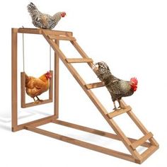 three chickens are standing on top of a ladder that is shaped like a chicken house