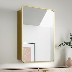 a bathroom sink with a mirror above it