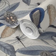 an image of a wallpaper with blue leaves and dragonflys on the background