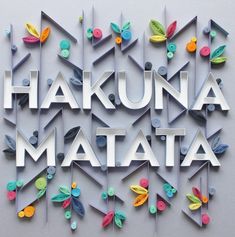 the words hakuna matata are cut out of paper