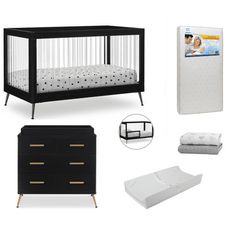 a baby crib, changing table and bed with white sheets