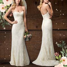 two women in wedding dresses standing next to each other with flowers on the wall behind them