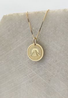 14K Real Solid Gold Necklace, Hallmarked on the back of your pendant for certification! ▪️ A beautiful and clean engraved El Castillo Pyramid   pendant made out of 14K Solid Real Gold. Available only in yellow gold! Pendant Thickness: 0.50mm Jump Ring inner diameter: 4mm Dimensions: - 13mm / 0.52 inches - 15mm / 0.59 inches - 18mm / 0.70 inches - 20mm / 0.78 inches - 22mm / 0.86 inches - 24mm / 0.94 inches Necklace Length - You can choose your chain length from 35CM to 50CM. The pendant is avail 14k Gold Etched Medallion Jewelry, 14k Gold Medallion With Engraving Option Jewelry, 14k Gold Medallion With Engraving Option, Symbolic 14k Gold Jewelry With Engraving Option, Etched Yellow Gold Jewelry For Commemoration, Classic Etched Jewelry For Commemoration, 14k Gold Jewelry With Engraving Option For Commemoration, Classic 14k Gold Necklace With Engraving Option, 14k Gold Jewelry For Commemoration