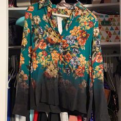 This Is A Beautiful Green Floral Blouse. Never Been Worn, Brand New. Smoke Free Home Elegant V-neck Shirt With Floral Print, Chic Multicolor Blouse With Button Closure, Green Silk Button-up Blouse, Silk Button-up Shirt With Floral Print, Elegant Multicolor Floral Print Shirt, Multicolor Silk Button-up Blouse, Fall Floral Print V-neck Shirt, Fall Silk Shirt With Floral Print, Silk Button-up Top With Floral Print