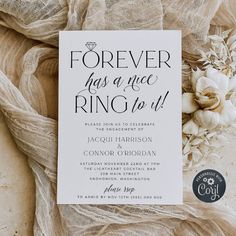 a white wedding card with the words forever has a nice ring to it on it