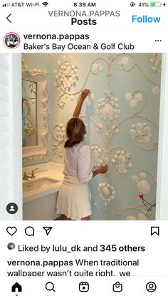 a woman is painting a wall with flowers on it and the words, verna papapass baker's bay ocean & golf club