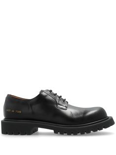 black calf leather front lace-up fastening low block heel serial number print at the heel round toe rubber sole branded insole Derby Lace-up Shoes With Vibram Sole In Calf Leather, Calf Leather Lace-up Shoes With Vibram Sole For Derby, Luxury Oxfords With Vibram Sole For Derby, Black Lace-up Shoes With Lug Sole For Derby, Black Dress Shoes With Lug Sole For Derby, Black Dress Shoes With Lug Sole For Formal Events, Black Oxfords With Vibram Sole For Derby, Balenciaga Track, Common Projects