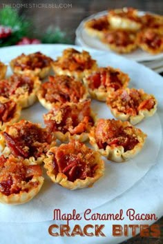 small appetizers are arranged on a white plate