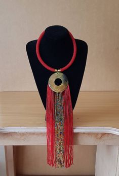 Beatiful women necklace. Main color: Red Available in different colors.  More necklaces here; https://www.etsy.com/shop/PrimeBeadsKe?ref=seller-platform-mcnav&section_id=33399833 All items are shipped through dhl express! Handmade Red Long Necklace, Handmade Long Red Necklace, Red Long Beaded Necklaces For Gifts, Red Large Beads Choker Necklace, Red Beaded Choker With Large Beads, Handmade Red Beaded Choker Necklace, Handmade Red Choker Necklace, Unique Handmade Red Beads, Handmade Red Beads