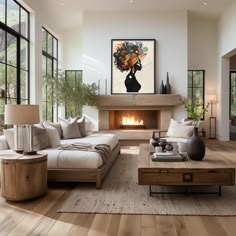 a living room filled with furniture and a fire place in the middle of a room