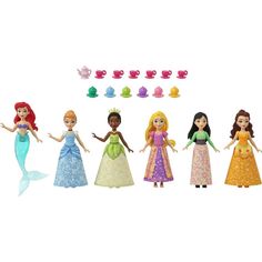 the disney princess dolls are lined up together