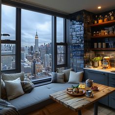 a living room filled with furniture next to a window covered in lots of windows overlooking the city