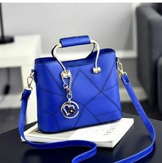 Leather Shoulder/Handbag Modern Blue Handheld Shoulder Bag, Modern Handheld Blue Shoulder Bag, Blue Handheld Office Bag, Blue Handheld Shoulder Bag For Office, Trendy Blue Shoulder Bag For Office, Trendy Blue Leather Shoulder Bag, Trendy Blue Leather Satchel, Pu Leather Bag, Evolution Of Fashion