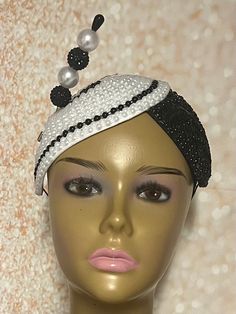 Show stopper! This elegant Black and White Beaded Fascinator half hat is trimmed with a and hat pin. The hat pin is for decorative purposes only and is not intended to secure the hat to your head. The hat is affixed to the head via a hatstring. The hat measures approximately 11.75 inches X 5.5 inches at the widest part of the white side. The widest part of the black beaded side measures 4.5 inches. PLEASE NOTE All items for Free Shipping will be shipped via USPS First Class Mail. Gifts for mom, Handmade White Wedding Costume Hats And Headpieces, White Handmade Wedding Costume Hats And Headpieces, Handmade White Wedding Headpieces, Elegant Bead Cap Headband, Elegant White Handmade Mini Hat, Elegant Handmade White Mini Hats, White Handmade Headband For Parties, Handmade White Headband Headpiece, Handmade White Mini Hats For Party