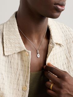 Foundrae's belcher chain necklace is threaded with an oval pendant featuring the four cardinal directions, mirrored to reflect your 'Internal Compass', the bale is studded with rows of pavé diamonds. It's handcrafted from white gold and designed to sit just below the collar bone. Timeless Jewelry With Coin Pendant, Timeless Jewelry With Oval Coin Pendant, Timeless Oval Coin Pendant Jewelry, Engraved White Gold Oval Pendant Necklace, Timeless Oval Pendant Necklace, Sterling Silver Oval Necklace With Coin Pendant, White Gold Oval Coin Pendant Jewelry, White Gold Oval Coin Pendant Necklace, White Gold Oval Coin Pendant