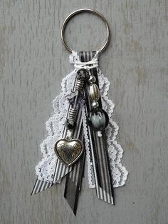 a keychain that has some kind of ribbon on it