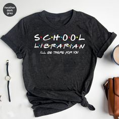 School Librarian  I'll Be There For You Shirt, Elementary Librarian Shirt, Librarian Gift, Book Lover, Library Shirt, School Librarian Gift * Unisex T Shirt: "Bella Canvas" - Retail fit, Runs true to size. - Solid colors: 100% Ring-Spun soft cotton. Heather colors: 52% Ring-Spun cotton 48% polyester. * V-Neck T Shirt: "Bella Canvas" - Retail fit, Runs true to size. - Solid colors: 100% Ring-Spun soft cotton. * Women's T Shirt: "Anvil"  Feminine cut, Runs smaller than usual (Please use the size c Library Shirts School Librarian, Librarian Aesthetic, Elementary Librarian, Library Shirt, Librarian Style, Oc Stuff, Librarian Shirt, School Librarian, Gifts For Librarians