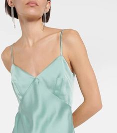 Look to Max Mara for understated elegance such as the Selce maxi dress. Made from lustrous satin in a turquoise hue, the slip design hangs by slim straps and fastens with an invisible zipper at the back..Made in Italy.Material: 29% viscose, 71% acetate.Closure: zipped back, buttoned back.Lining: 10% silk, 85% acetate, 5% polyamide.Care instructions: dry clean.True to size.Cinched waist.Mid-weight material.DT = German size.The model seen in the picture is 178cm-5'10' and wearing a size DT 34 Green Formal Slip Dress For Summer, Solid Satin Maxi Dress For Summer, Green Slip Dress With Spaghetti Straps And Bias Cut, Green Bias Cut Slip Dress With Spaghetti Straps, Solid Satin Summer Dress, Solid Color Summer Evening Slip Dress, Spring Satin Finish Maxi Dress For Night Out, Silk Maxi Dress With Spaghetti Straps For Night Out, Spring Evening Slip Dress With Delicate Straps