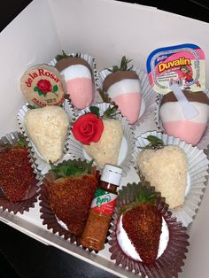 a box filled with lots of different types of desserts and confection items