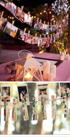 a table topped with candles and pictures hanging from clothes pins on the clothes pegs