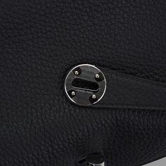 Guaranteed authentic Hermes Mini Lindy 26 bag featured in Black.Plush Clemence leather.Crisp with Palladium hardware.Functional as a top handle bag or a hands free shoulder bag.Exterior pocket on each side and surprisingly spacious interior.Top has two zippers for easy closure.The Clemence leather is soft and pliable, adding so much to the styling of the bag.Comes with signature Hermes box and sleeper.NEW or NEVER WORN. final saleBAG MEASURES:LENGTH 26 cm / 10.25"TALL 17.25 cm / 6.25"DEEP 13 cm Designer Office Bag With Gunmetal Hardware, Designer Office Bags With Gunmetal Hardware, Modern Business Bags With Turn-lock Closure, Modern Business Bag With Turn-lock Closure, Modern Top Handle Shoulder Bag With Palladium Hardware, Modern Shoulder Bag With Palladium Hardware And Top Handle, Office Satchel With Gunmetal Hardware And Top Handle, Designer Satchel With Turn-lock Closure For Everyday Use, Modern Shoulder Bag With Top Handle And Palladium Hardware