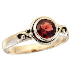 Elevate your hand with a delicate and distinctive touch with this vintage-style ring in yellow gold. Centered with a round garnet in a bezel setting, emitting a rich red hue, this piece exudes sophistication. The band, embellished with decorative scrolls detailing, further enhances the ring's timeless elegance, rendering it a perfect choice for any occasion. CHARACTERISTICS Status: Made to order Origin: Thailand Metal: Solid 9K Yellow Gold Ring Size: US 3-8 Total Gemstones Weight: 1.00 carat. (approx.) Total Gram Weight: 3.40 g. (approx.) *Pictures have been enlarged to show details* PRIMARY STONE(S) Stone: Natural Garnet Color: Red Shape: Round Size: 6 mm. Number: 1 Weight: 1.00 Carat (approx.) An attractive ring box is included. We dispatch all items via a secure and trackable for delive Garnet Color, Filigree Ring Gold, Vintage Inspired Rings, Carved Ring, Vintage Style Rings, Rings Diamond, Modern Ring, Garnet Stone, Eye Ring