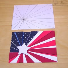 two pieces of paper cut out to look like an american flag starburst pattern