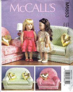 two dolls standing next to each other in front of a couch with hearts on it