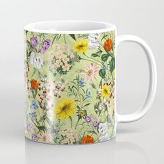 a coffee mug with an image of flowers on it