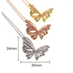 Looking for a Unique Butterfly Necklace? Sparkle with this CZ Cubic Zirconia Butterfly necklace. Material: brass alloy, yellow gold, rose gold and silver platting Measurements: necklace 20 in with 2 in extension, pendent is approximately 1 in x 1 in Who is this for: A woman who loves Butterflies but is looking for a different unique sparkling necklace. Delivered to your home in an elegant gift box. Do you wish this necklaces was just alittle bit longer? Add one of these stainless steel necklace extender to achieve the perfect length, available in gold or silver tone. Butterfly Necklace Silver, Unique Butterfly, Rose Gold And Silver, Sparkle Necklace, Necklace Extender, Necklace Elegant, Butterfly Necklace, Steel Necklace, Stainless Steel Necklace