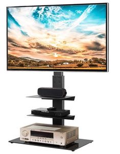 a flat screen tv sitting on top of a stand next to a wall mounted dvd player