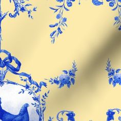 a blue and yellow wallpaper with an image of a rooster on it's side