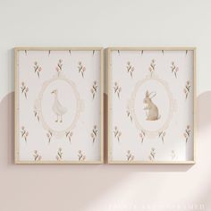 two framed pictures hanging on the wall next to each other, one with a rabbit and another with a bird