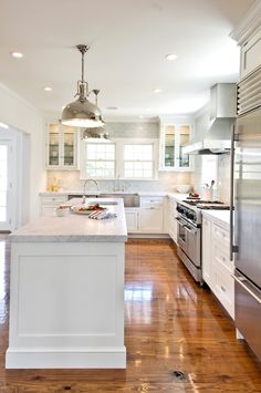 the kitchen is clean and ready to be used as an appliance for cooking