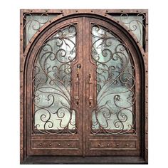 an ornate wooden door with glass panels and wrought iron work on the top part of it