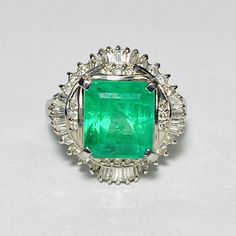 GG Certified 900 Platinum Emerald Diamond Cocktail Ring Size 7  1 Rectangular step-cut emerald, measuring approx. 9.80 x 8.91 x 7.38 mm  Color: Bluish-green Clarity: Transparent Approx. carat weight: 4.30ct * Natural emerald, fracture-filled  26 Round brilliant cut diamonds, measuring approx. 1.00-1.20 mm  Color: H-J Clarity: VS-SI Approx. total carat weight: 0.20cttw  * Natural diamond 20 Baguette cut diamonds, measurement approx. 2.00 x 1.25 x 1.00 mm  Color: H-J Clarity: VS-SI Approx. total c Biedermeier Furniture, Mercedes Maybach, Diamond Cocktail Ring, Step Cut, Diamond Cocktail Rings, Bluish Green, Baguette Cut Diamond, Emerald Jewelry, Baguette Cut