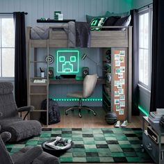 a room with a bunk bed, desk and chair