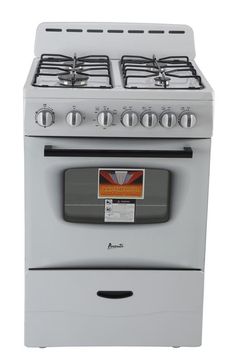 a white stove top oven sitting on top of a counter